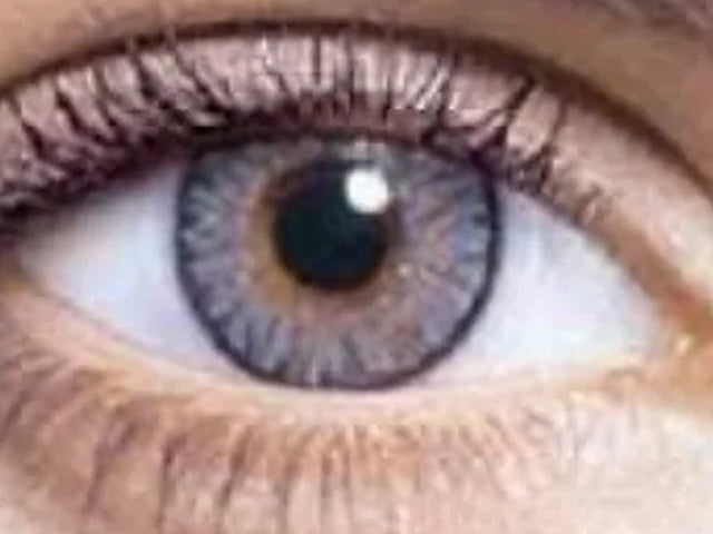 Ghost grey one-day Halloween contact lens on eye